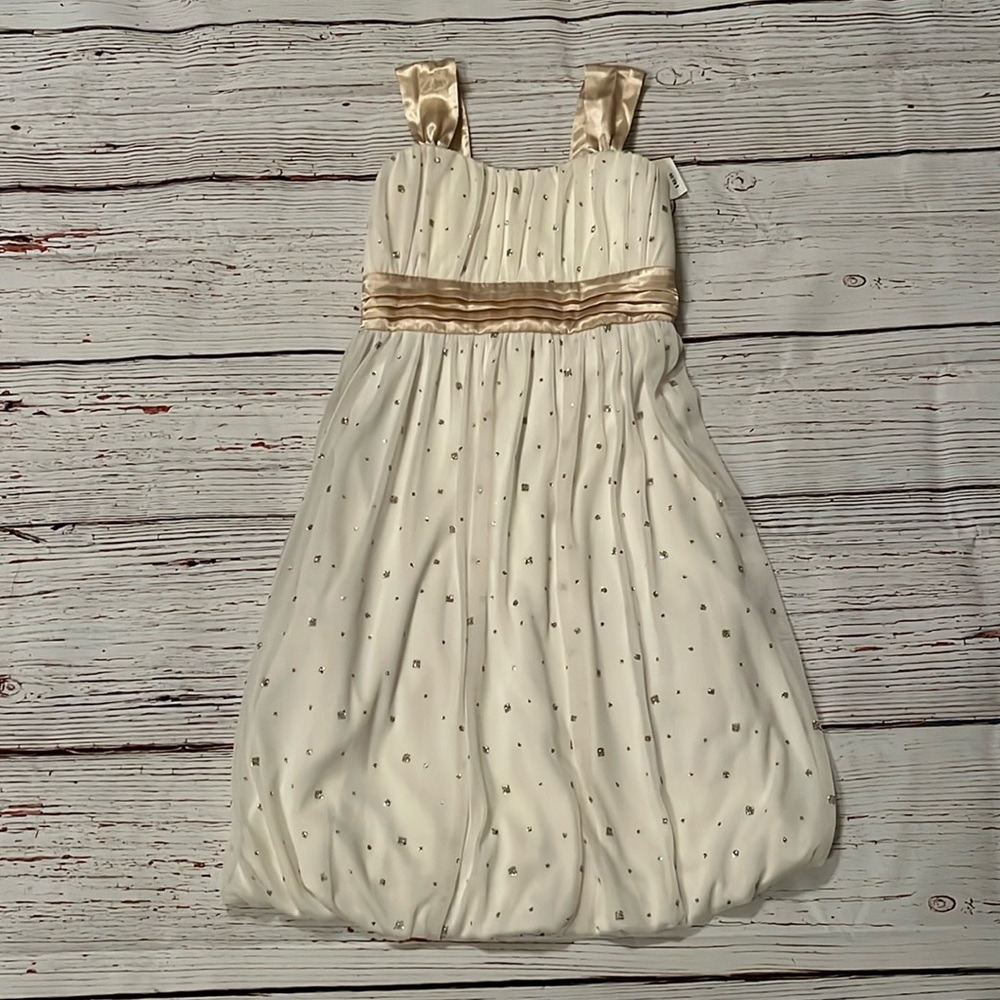 Junior size 16. Cream & gold dress bubble bottom, chiffon overlay glitter dots